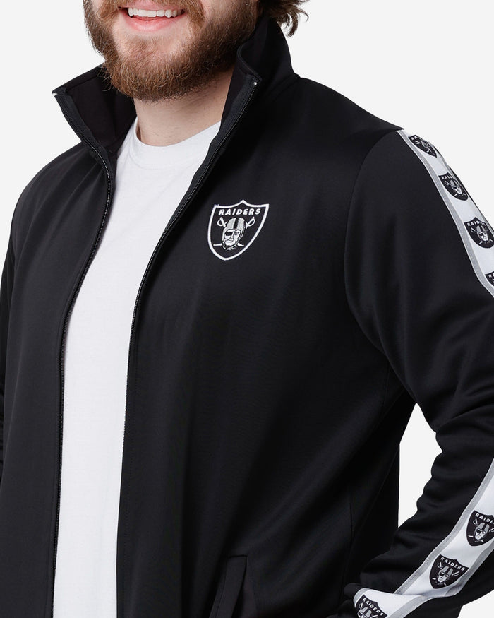 Las Vegas Raiders Stripe Logo Track Jacket FOCO - FOCO.com