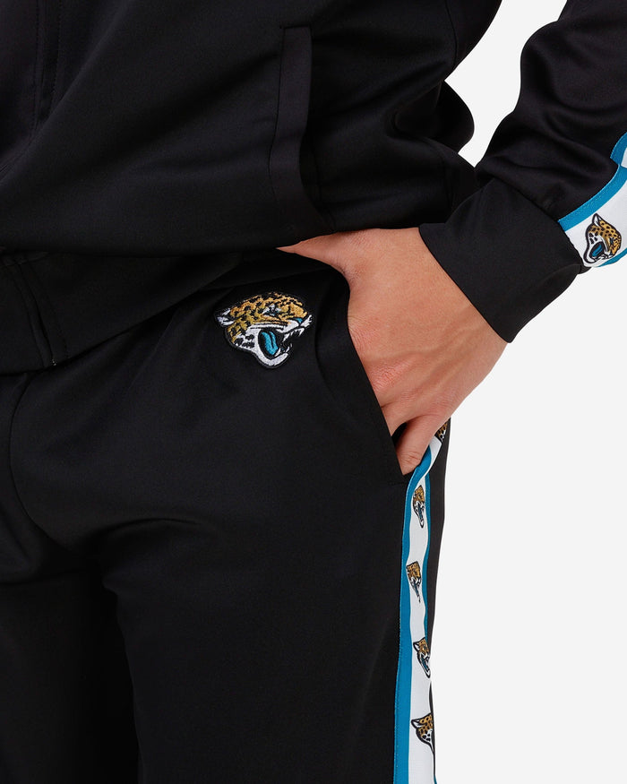 Jacksonville Jaguars Stripe Logo Track Pants FOCO - FOCO.com