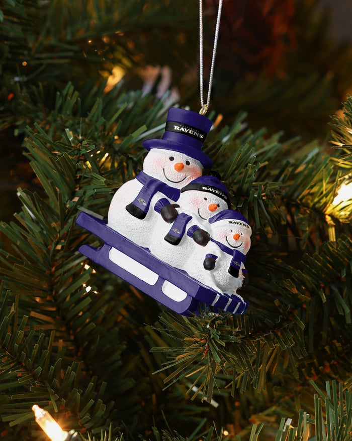 Baltimore Ravens Sledding Snowmen Ornament FOCO - FOCO.com