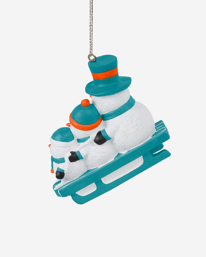 Miami Dolphins Sledding Snowmen Ornament FOCO - FOCO.com